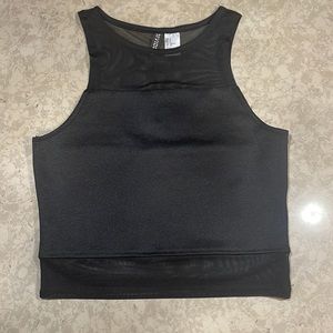 Black sheer sleeveless shirt.